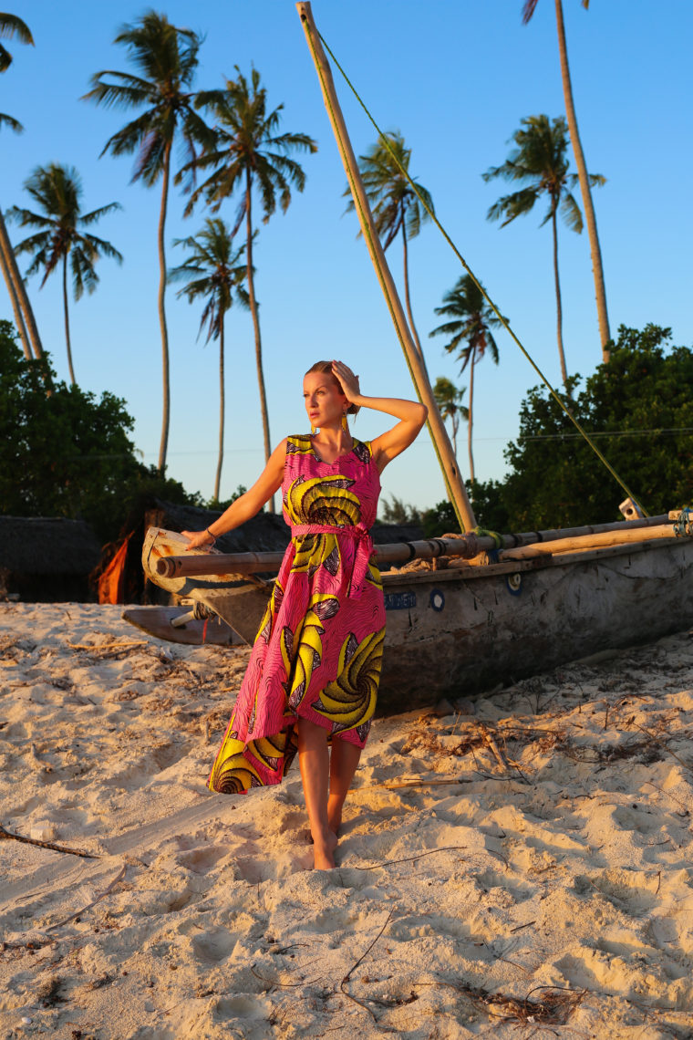 zanzibar tanzania beach sunset woman traditional dress