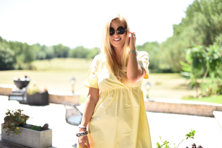 palina kozyrava in provence france yellow dress