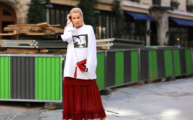 white sweatshirt, red dress, red bag, blonde