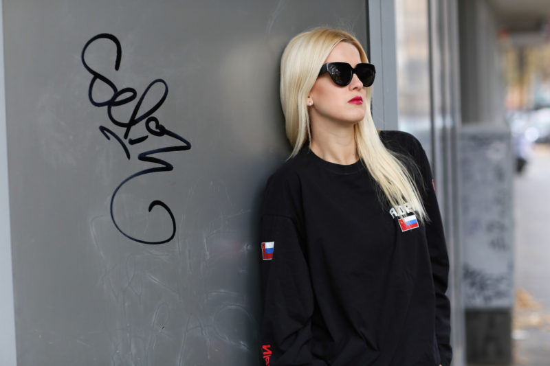 russian sweatshirt, print, black red, sunglasses, blonde