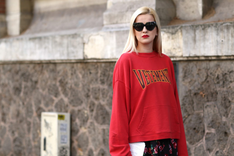 vetements, red hoodie, blonde, sunglasses, red lipstick